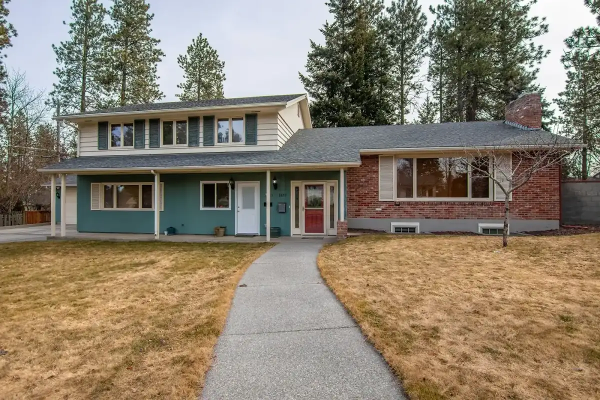Ranch-style house on a tree-lined lot