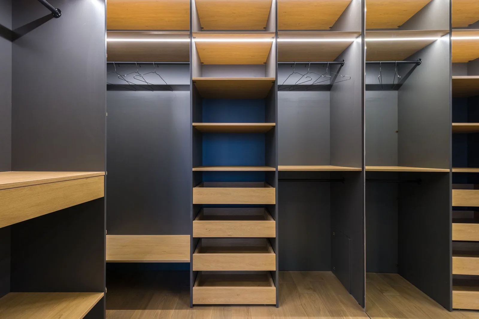 Built-in cabinetry and shelving in a finished room
