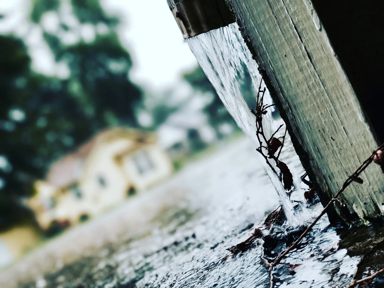 Gutter run being cleared on a house