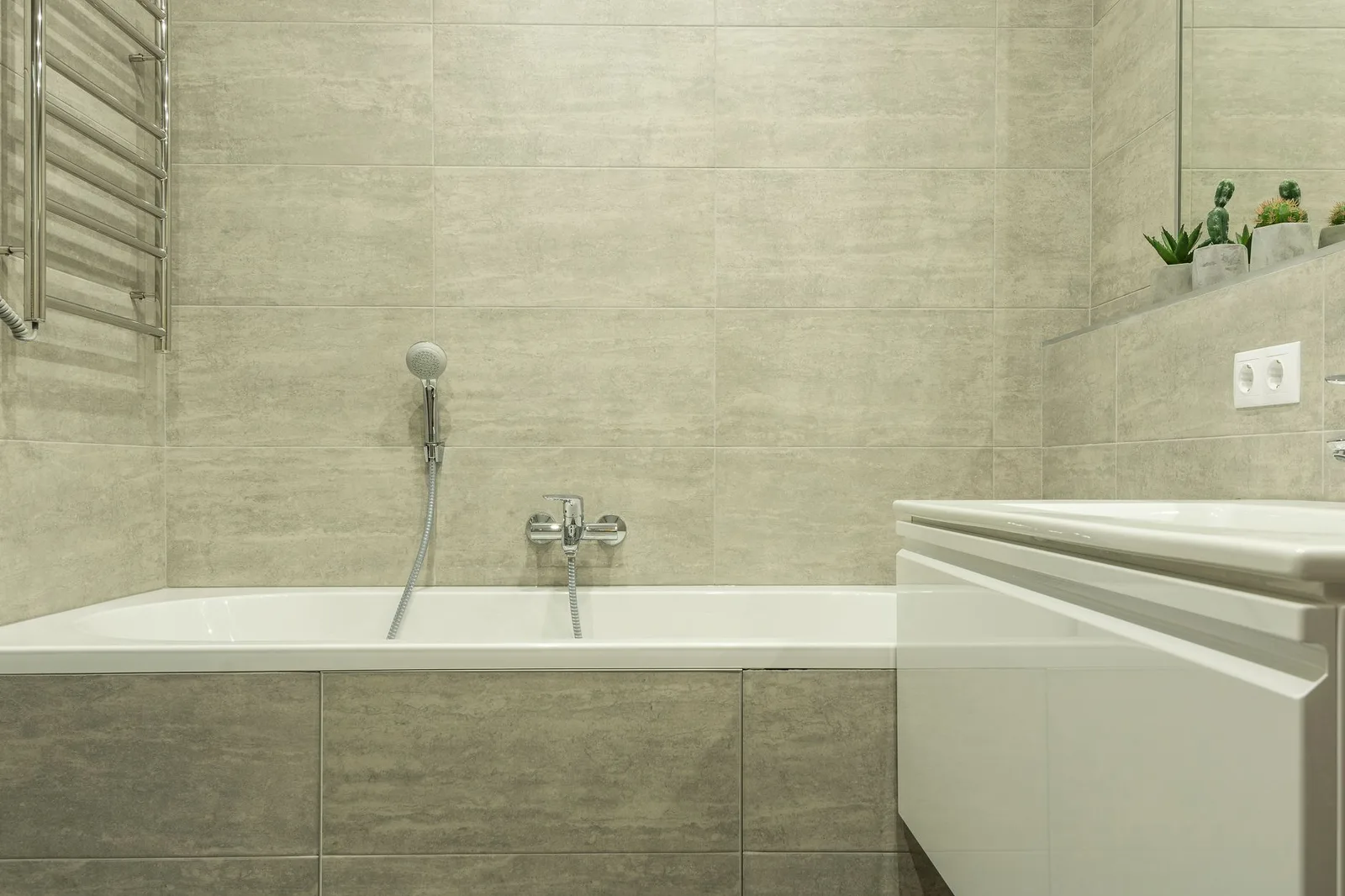 Wall tiles being set out and spaced