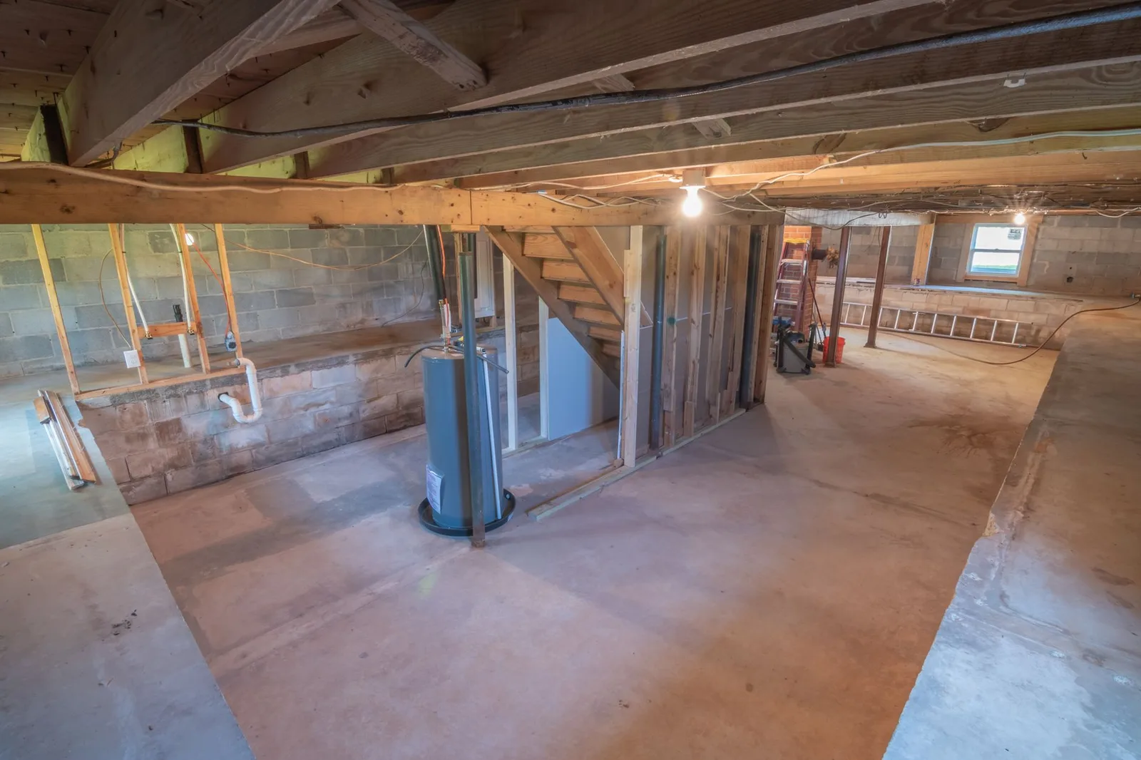 Basement stud framing against a block wall